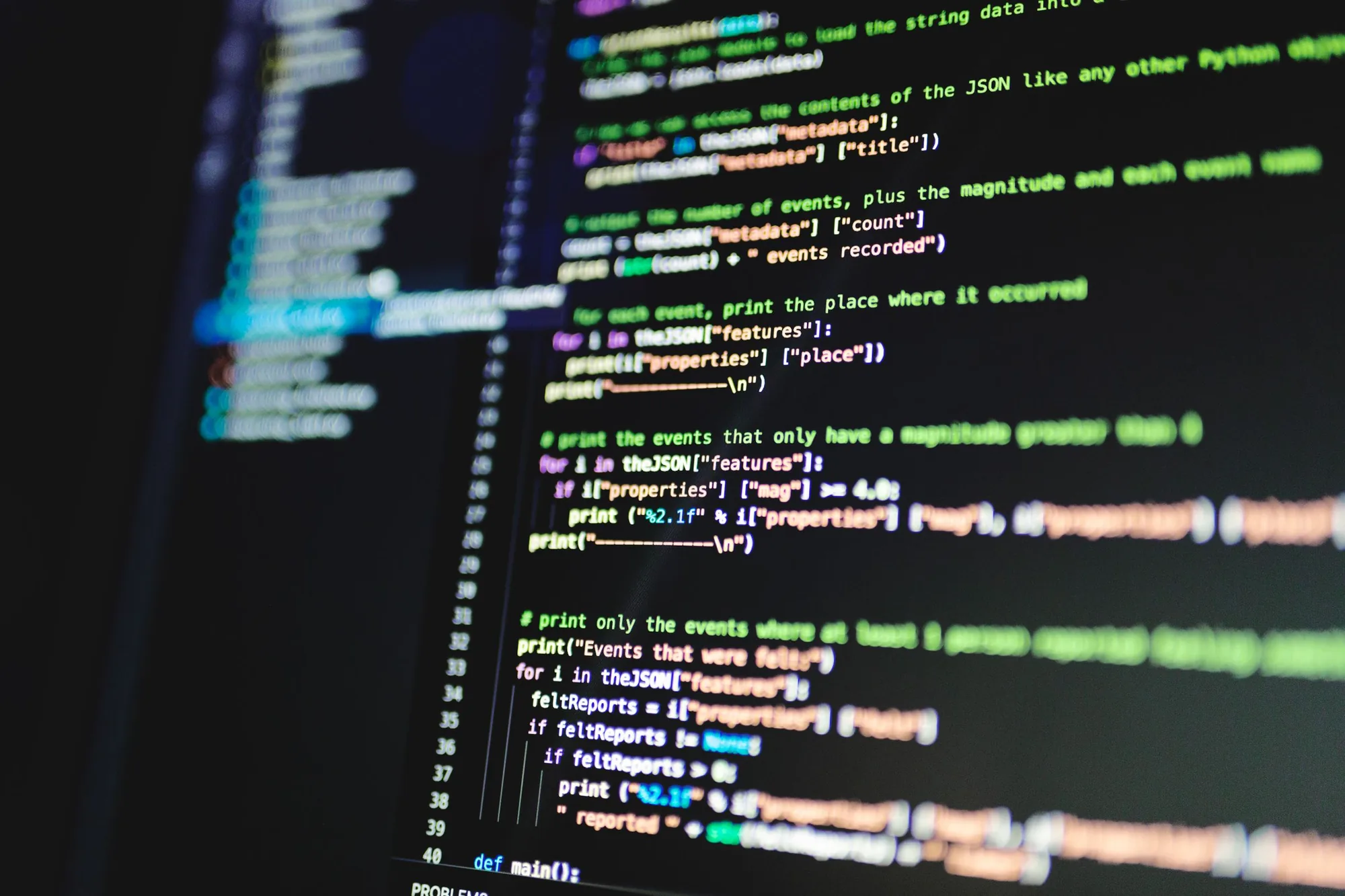 Close-up of source code in an editor on a monitor